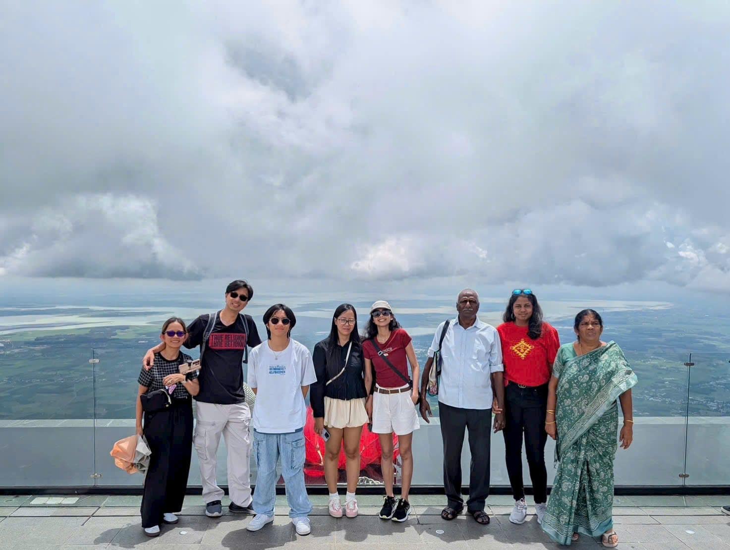 A group on the summit platform looking out over the Tay Ninh plain