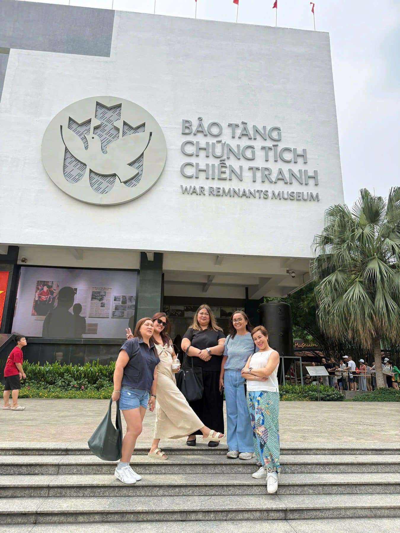 Guests on the steps of the War Remnants Museum